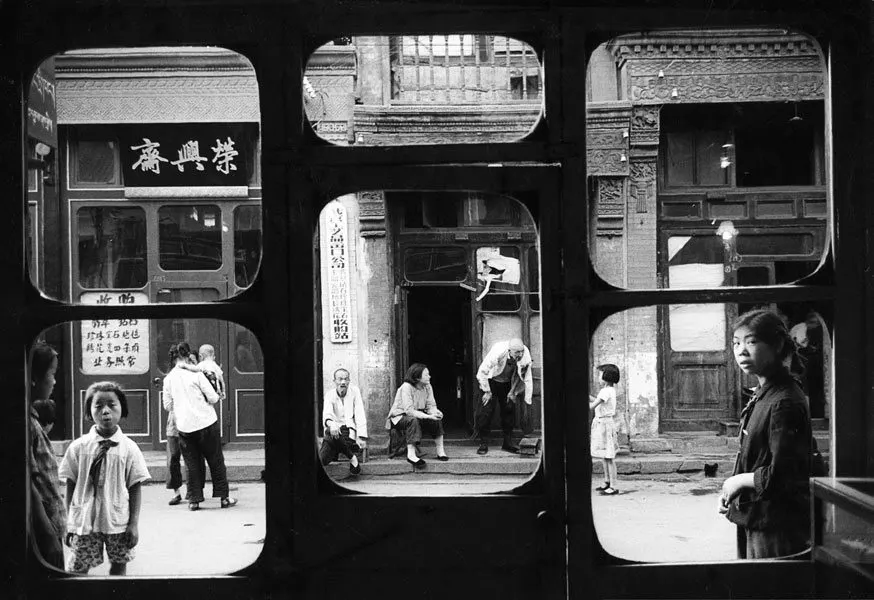 Marc Riboud’s Windowed Street Poem
